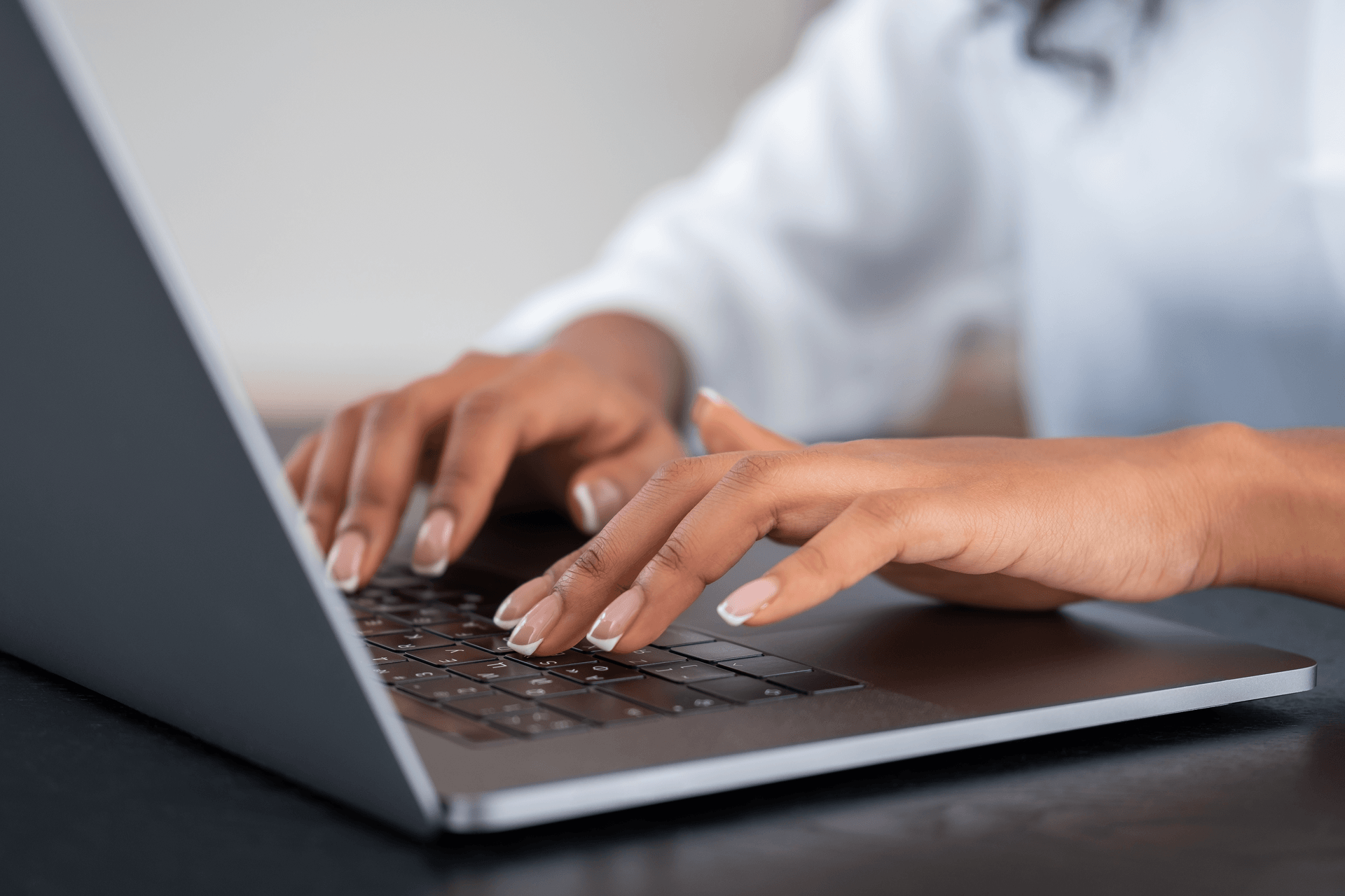 Person working on a laptop