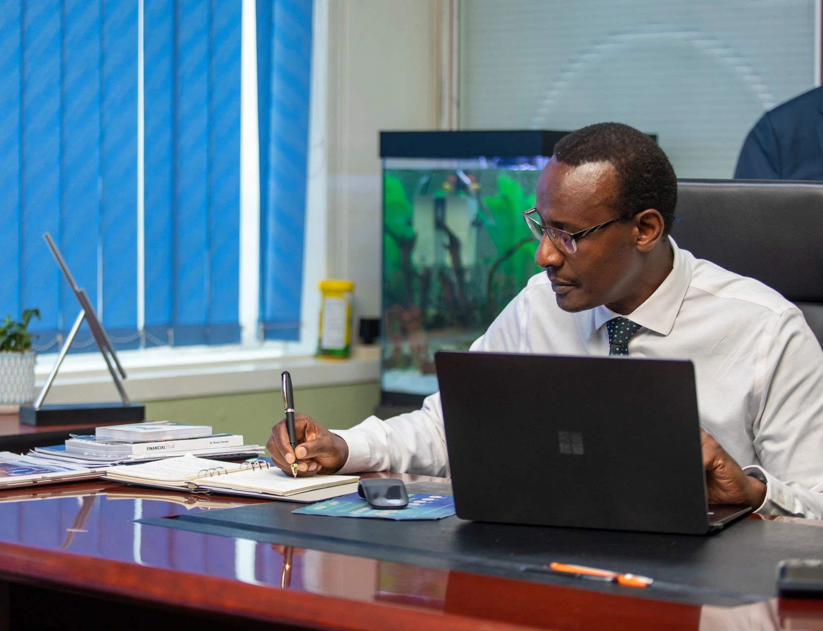 Finance professional working at his desk