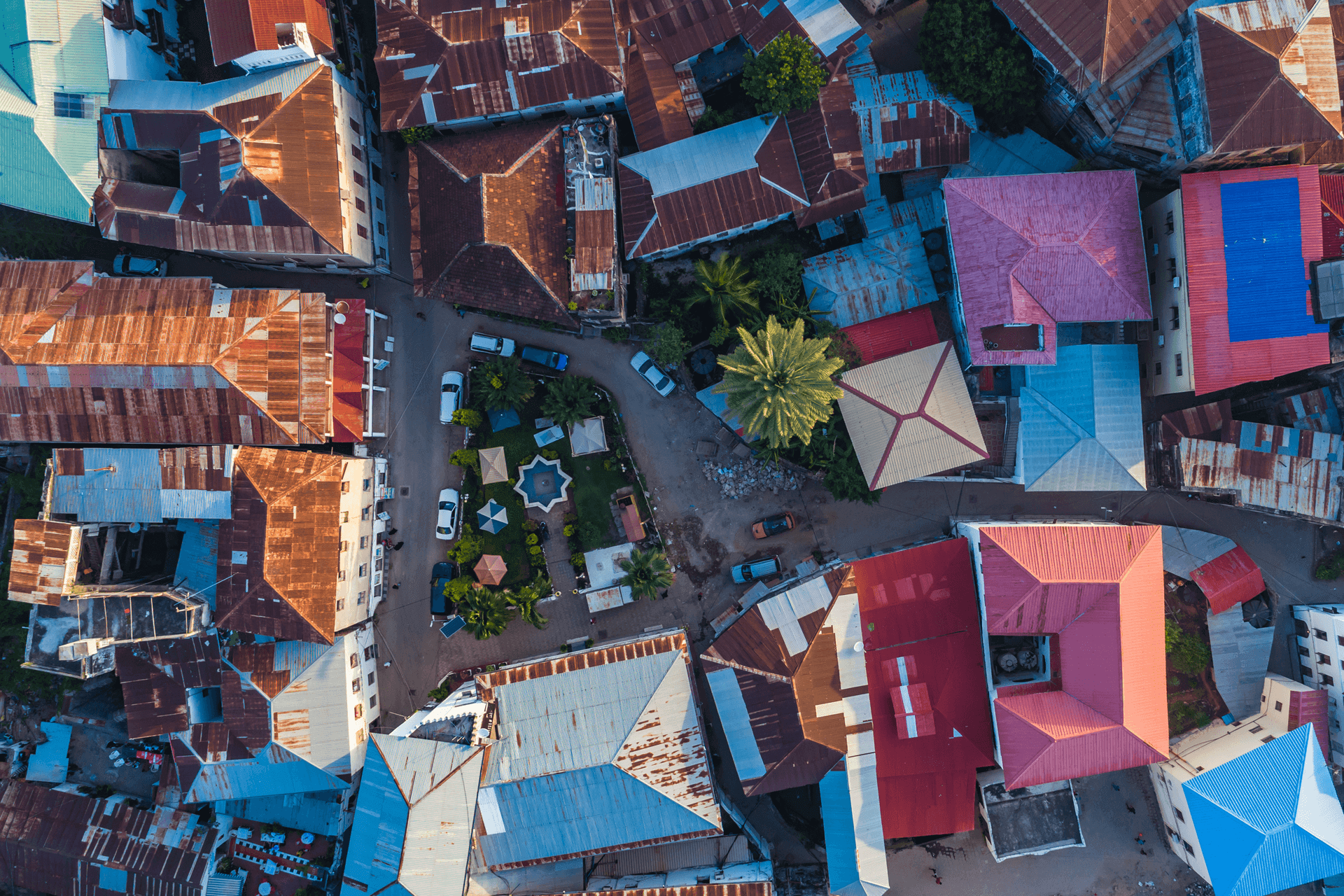 Aerial view of rooftops surrounding a town square