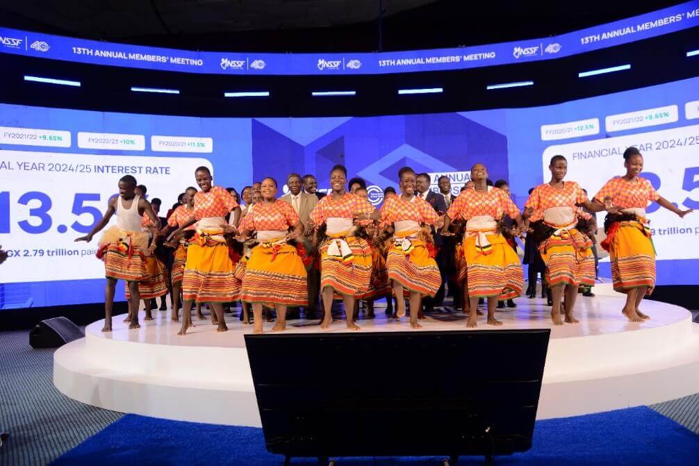 The Minister of Finance and Economic Development and NSSF Board members among performers following the declaration of a 13.5% interest rate at the 13th Annual Members Meeting.
