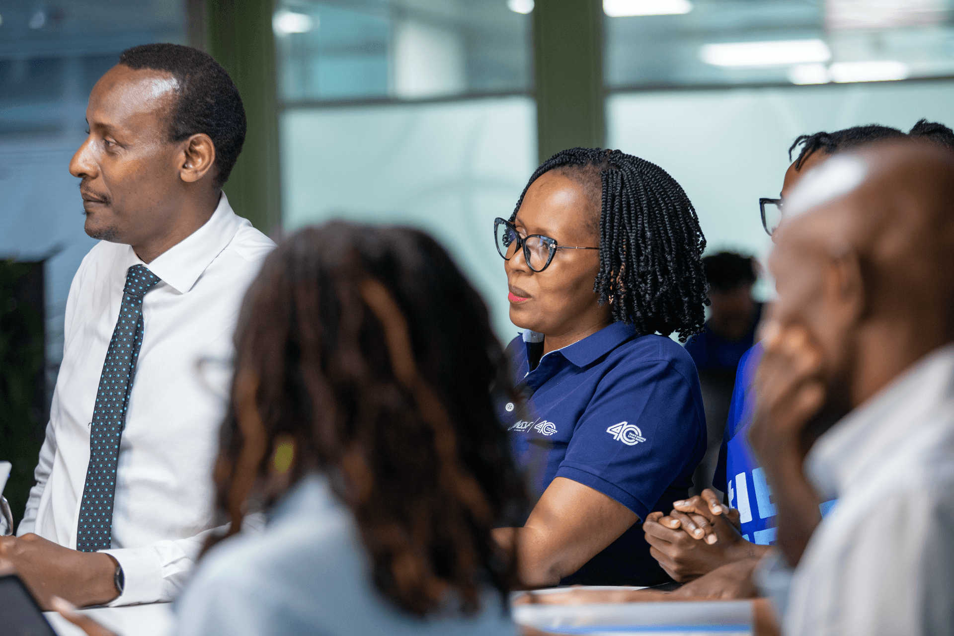 Participants listening during a meeting