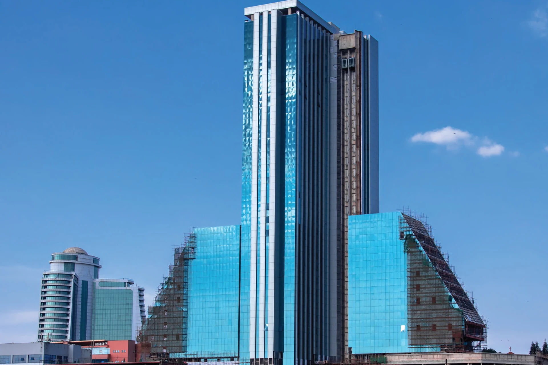 Glass-fronted high-rise building under construction